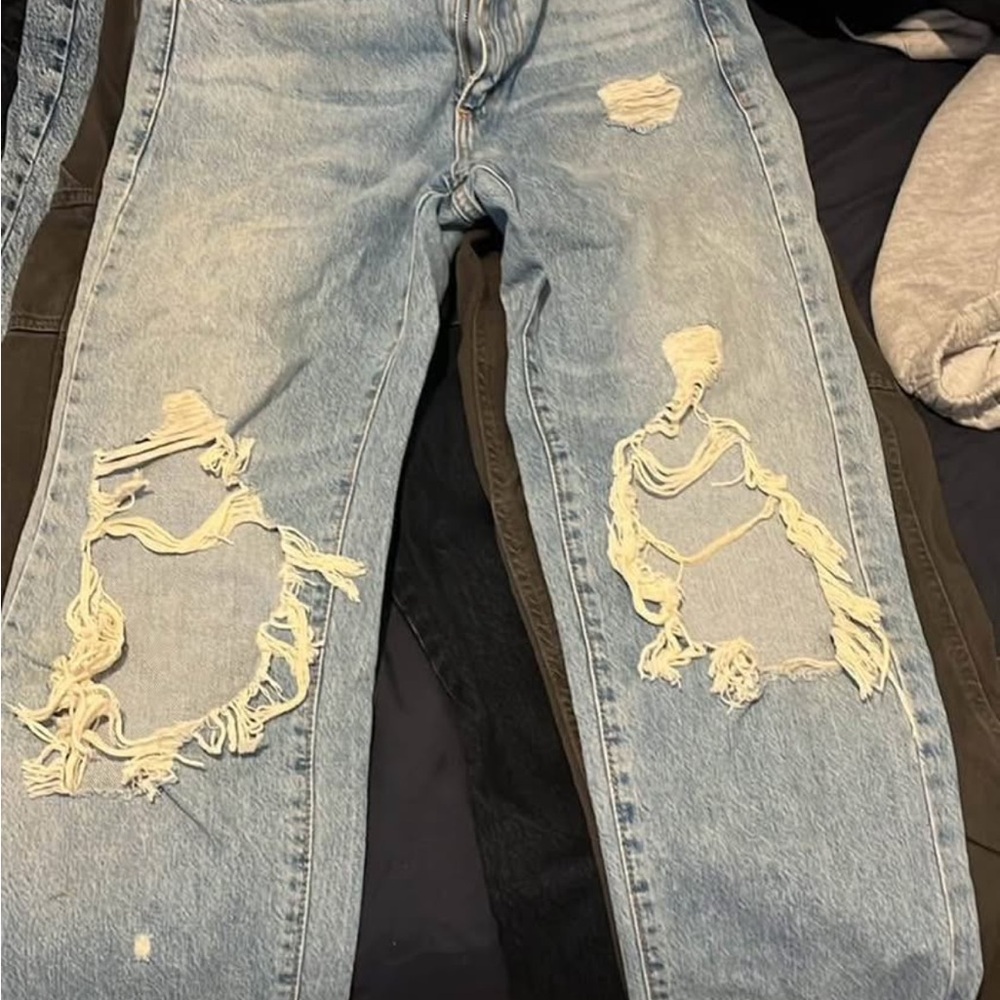 Distressed Light Blue Jeans